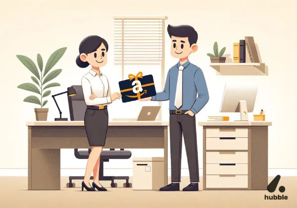 A manager handing an Amazon corporate gift card to an employee in the office.