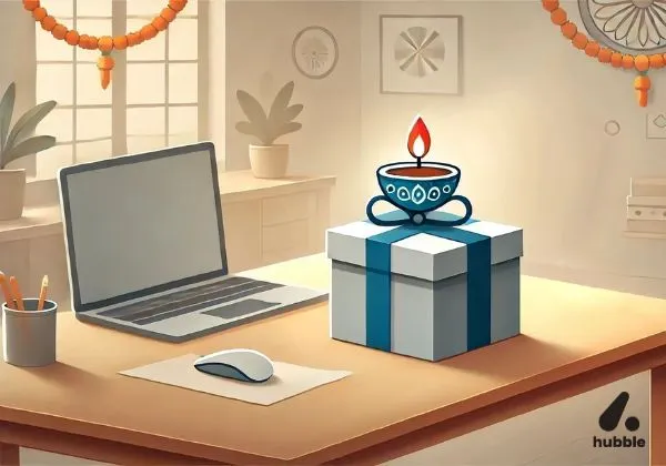 A gift box and traditional Diya placed on a desk in an office
