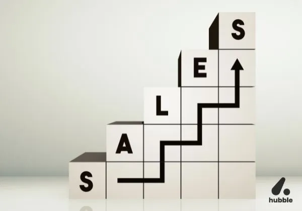 Stacked blocks spelling "SALES" with an upward arrow, symbolizing growth through data-driven insights in channel sales performance.